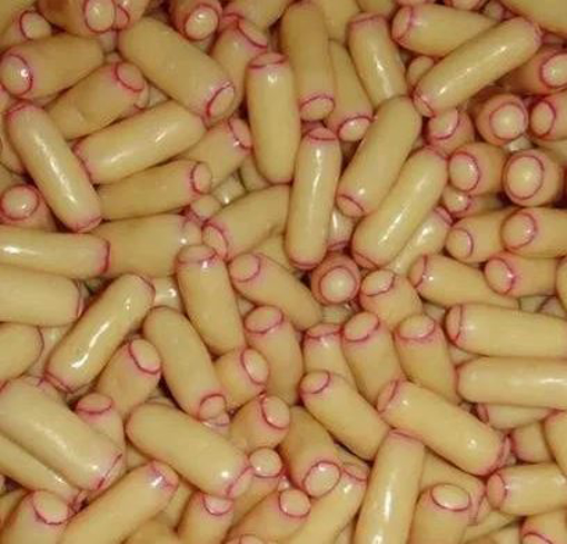 Picture of White Chocolate Raspberry bullets in 1kg bag